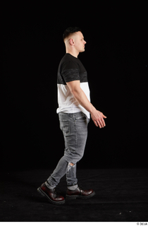 Torin  1 dressed side view walking whole body 0005.jpg